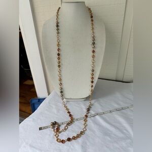 Long faceted neutral tone necklace with pearl beads